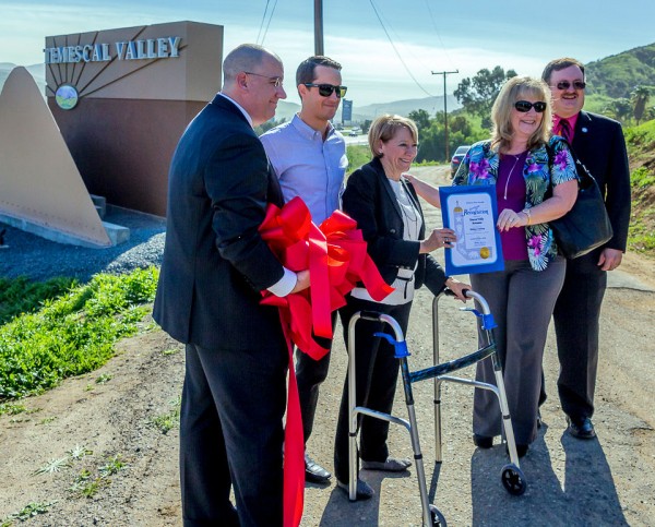 And, the ribbon is cut! From left, Jeffrey Van Wagenen, EDA managing director; Eric Werner, TV Municipal Advisory Council chairman; Sandy Isom; Deni Horne, representing Assemblywoman Melissa Melendez, and Supervisor Kevin Jeffries. Photo by Rob Mucha.