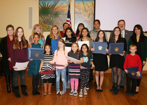 CALENDAR ART CONTEST WINNERS: Students were honored at the January MAC meeting by teachers, principals and elected officials, including Supervisor Kevin Jeffries, far right, back row.
